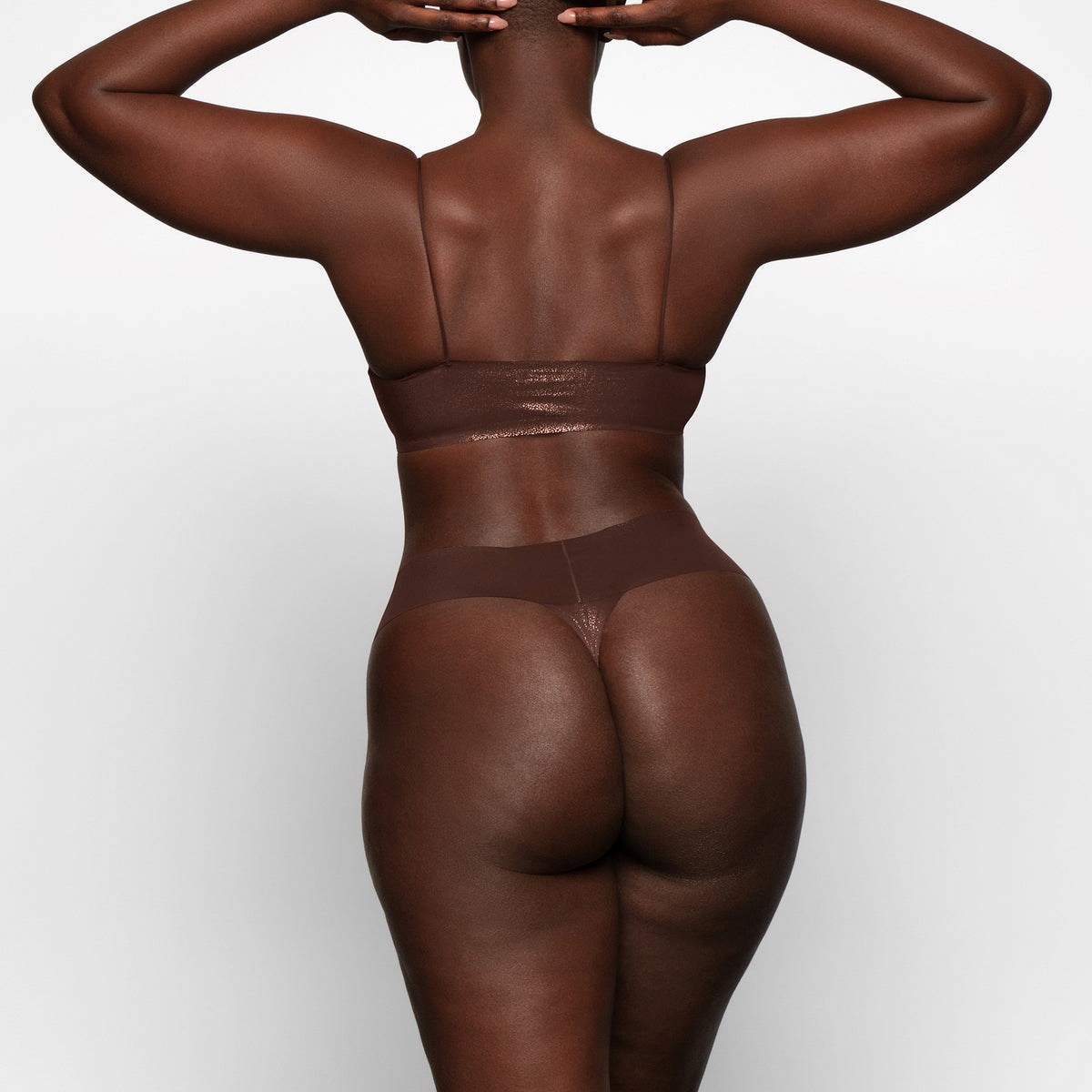 SKIMS Naked Shine Dipped Tanga Cocoa | BT2054367